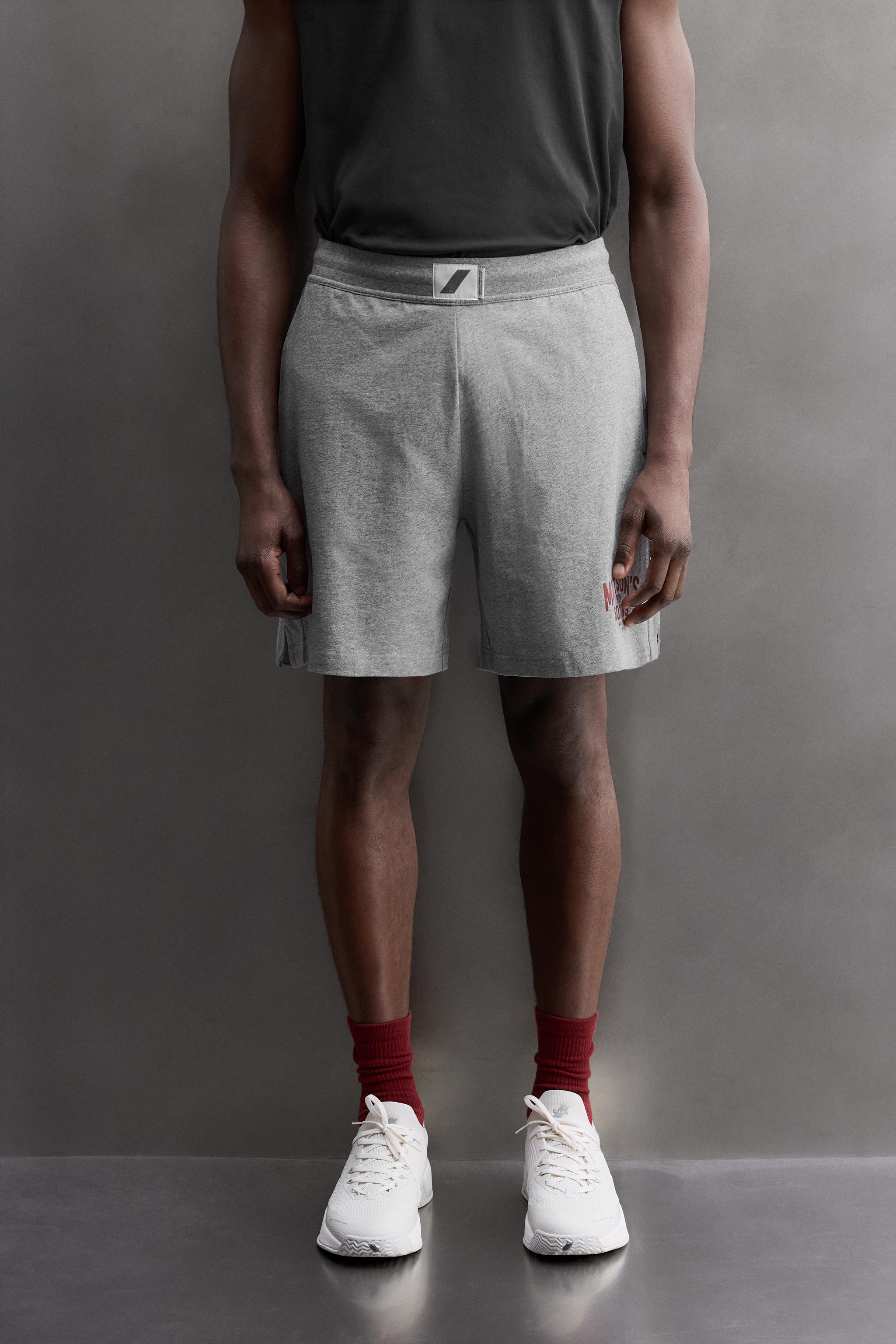 SHORT BRODÉ À BANDES 9"